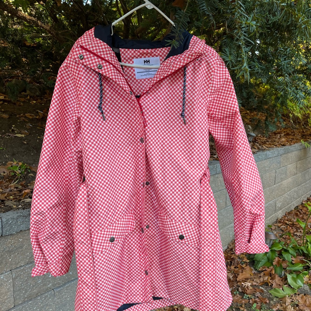 Helly Hansen Raincoat for women. 100% polyester shell and lining